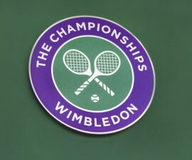 the championships wimbledon sign on wall tennis