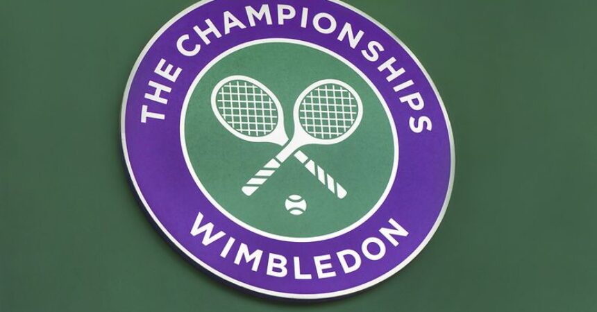 the championships wimbledon sign on wall tennis