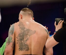 oleksandr usyk in boxing ring pictured from behind