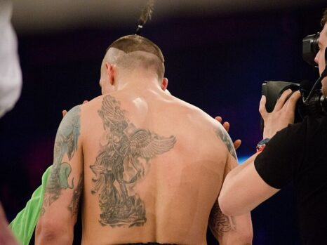 oleksandr usyk in boxing ring pictured from behind