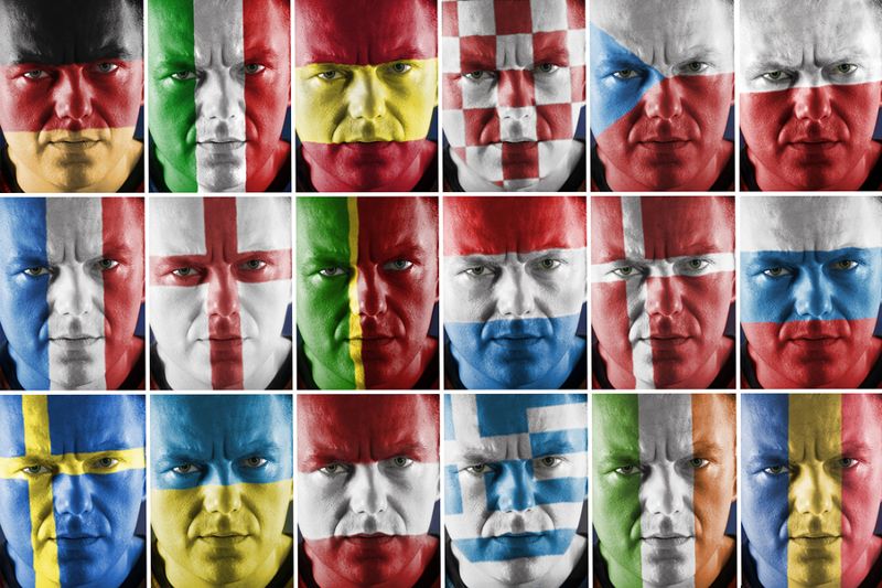 faces painted in different national flags